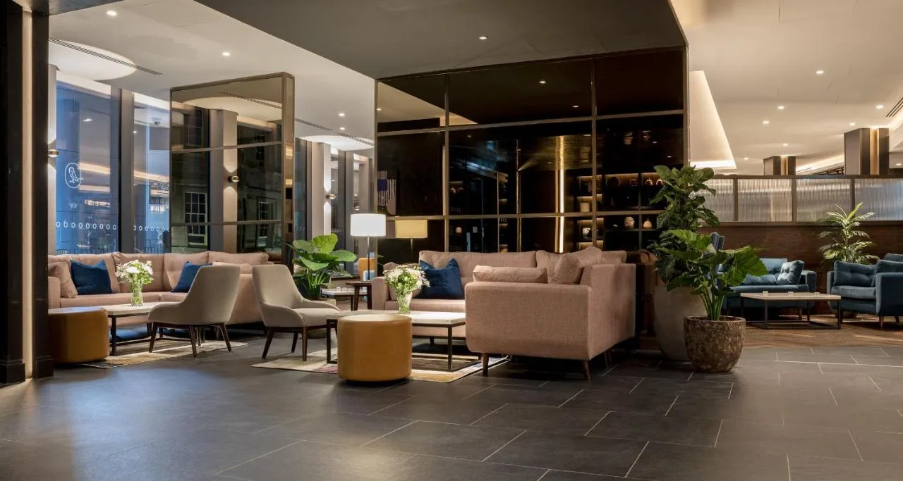 Lounge with sofas and tables at voco Edinburgh - Haymarket by IHG